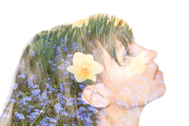 istock Woman in profile. Field spring flowers. Double exposure. 1144546579