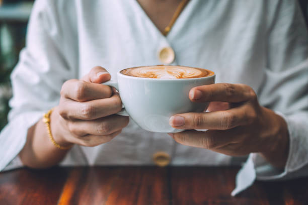 istock People are drinking a latte in a coffee shop. 1144547163