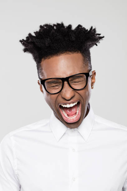 istock Funny young african businessman looking excited 1144547416