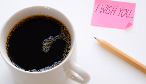 istock Cup of coffee on the table. Top view large . Sticker and pencil 1144547611