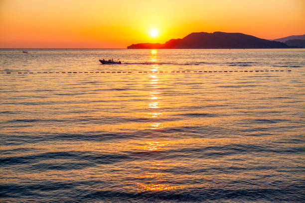 istock tropical island in sunset 1144549730