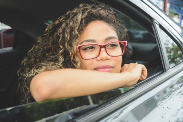 istock Woman looking out from the car window 1144550019