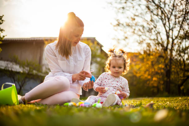 istock Playing on the lawn next to the house during the Easter 1144551174