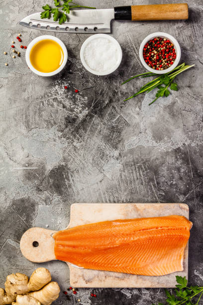 istock Raw salmon filet and ingredients, flat lay, top view 1144552395