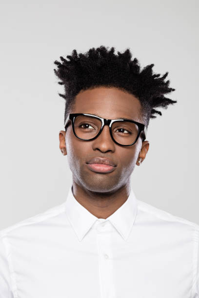 istock Nerdy businessman looking away thinking 1144552825
