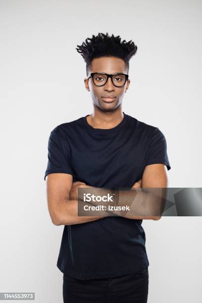 Handsome Young Man In Black Casuals Stock Photo - Download Image Now - Portrait, T-Shirt, Young Men