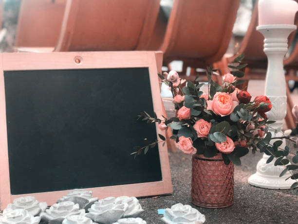 istock A bouquet in a rustic style with a frame and a black board for drawing a place for text 1144558791