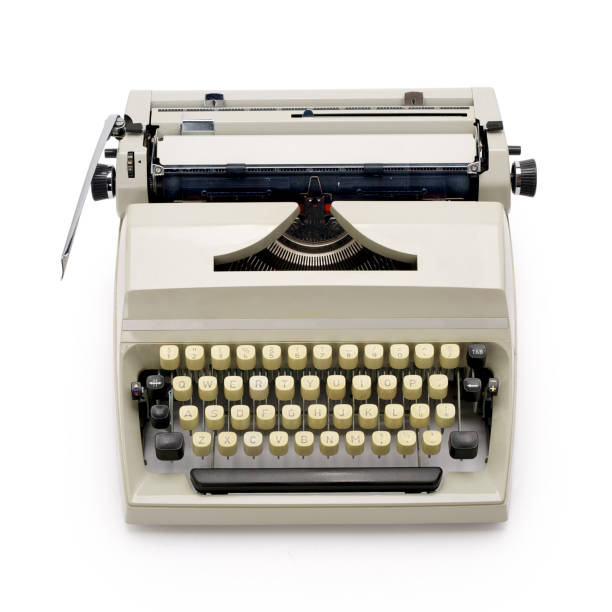 istock Top view of typewriter on white background, contains clipping path. 1144559041