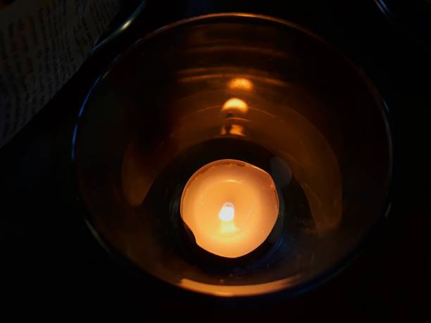 istock Candle in a glass cup 1144562543