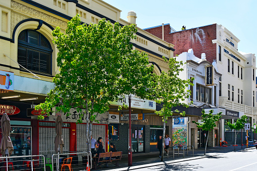 Perth, WA, Australia - November 30, 2017: Unidentified people, shops and buildings in Murray street in the capital from Western Australia
