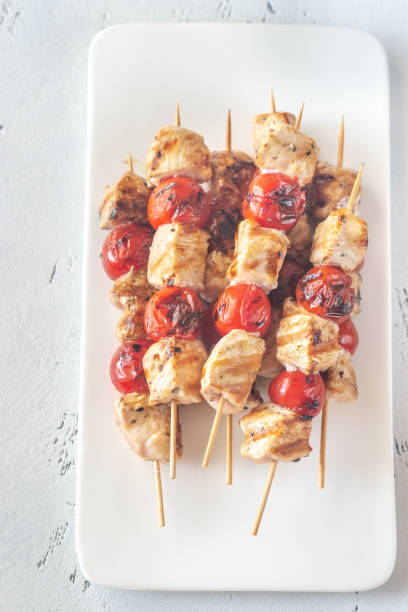 istock Grilled chicken skewers on the white plate 1144564219