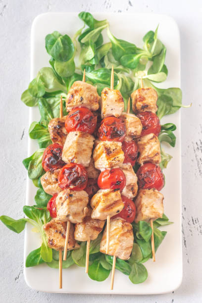 istock Grilled chicken skewers on the white plate 1144564248