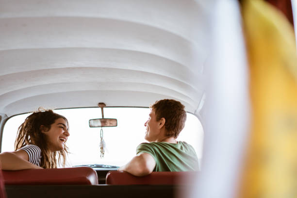 istock Side view of young couple inside car 1144564960