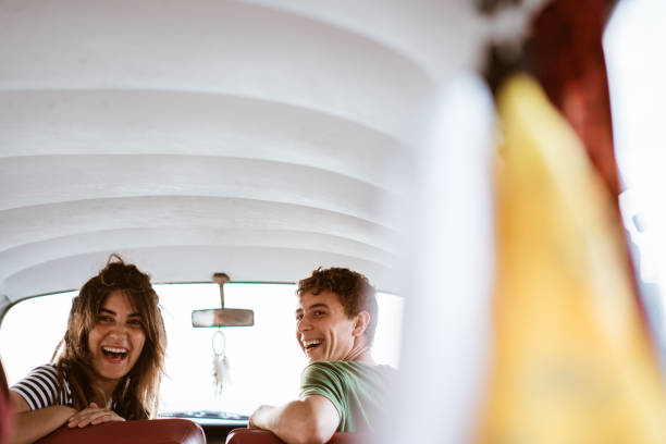 istock Cheerful young couple on a road trip 1144565590