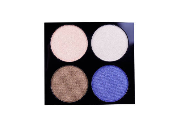 istock Set of four round eye shadow in a plastic black box isolated on white background 1144565942