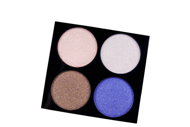 istock Set of four round eye shadow in a plastic black box isolated on white background 1144565946