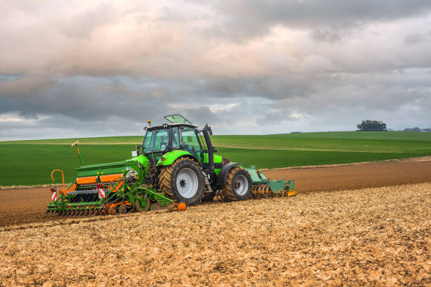 istock farmer planting the seeds in the fields 1144567054