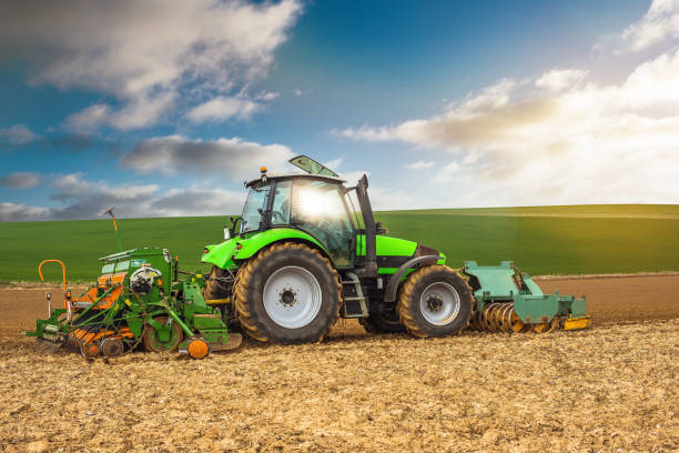 istock farmer planting the seeds in the fields 1144568219