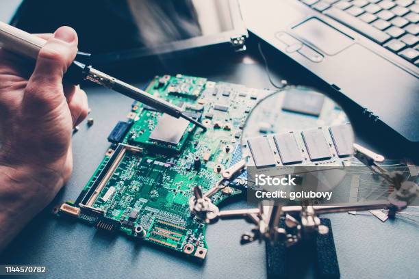 Pcb Layout Repairing Technician Soldering Laptop Stock Photo - Download Image Now - Electronics Industry, Repairing, Computer