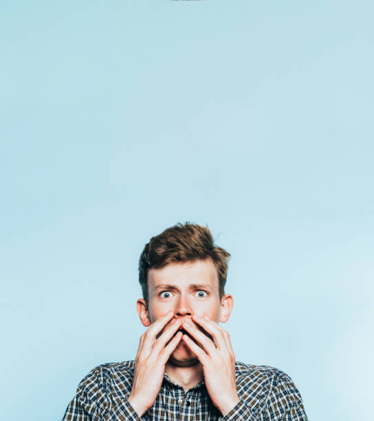 istock scared emotional shocked terrified disturbed man 1144570903