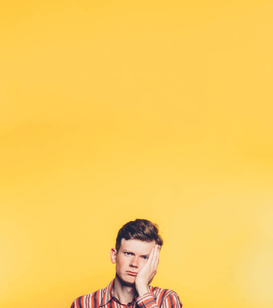 istock bored man portrait disappointed copy space 1144570904