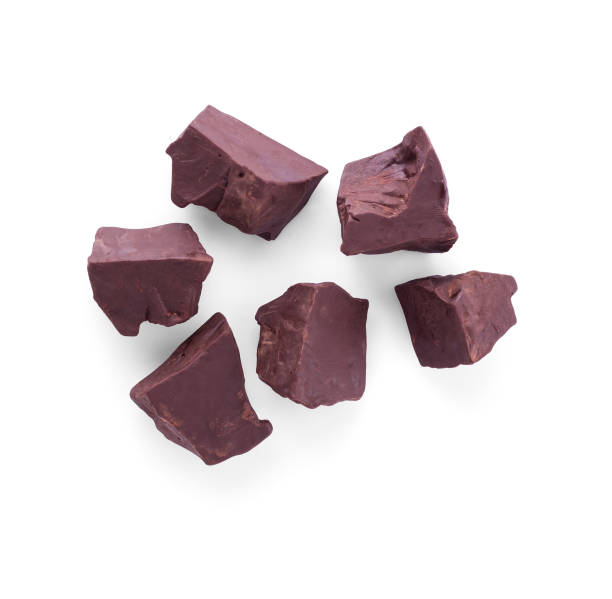 istock Large pieces of dark chocolate isolated on white background 1144572218