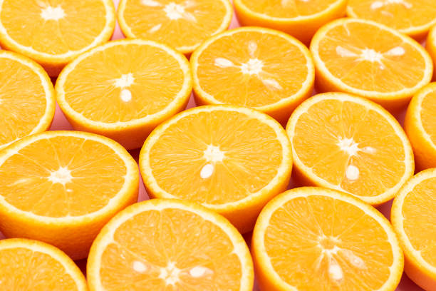 istock Orange juicy oranges are divided in half 1144574178