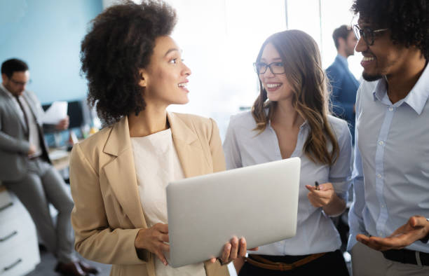 istock Successful business group of people at work in office 1144575945