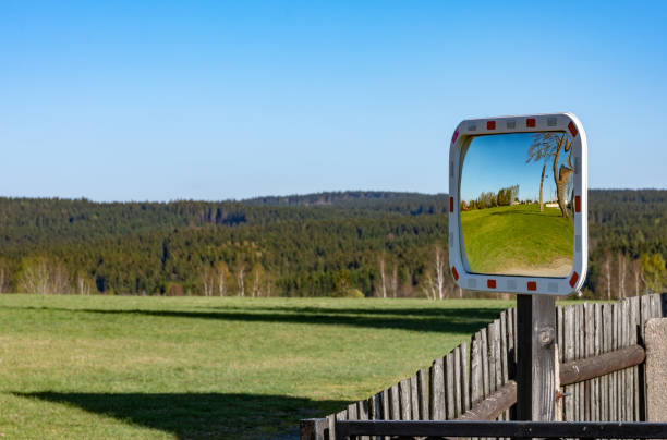 istock Mirror on fence reflecting spring landscape 1144577356