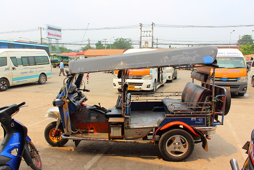 Aranyaprathet District, Thailand - Mart 27, 2018: Traditional three wheeled vehicle urban and taxi on bus station in Thailand near border Cambodia