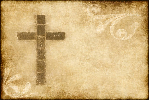 istock christian cross on parchment 114457970