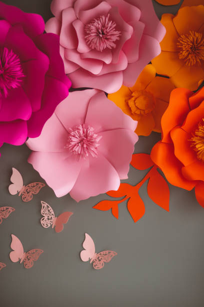 istock Pink and orange paper flowers 1144582521