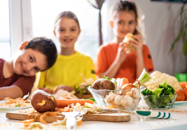 istock Children and vegetables. 1144582740