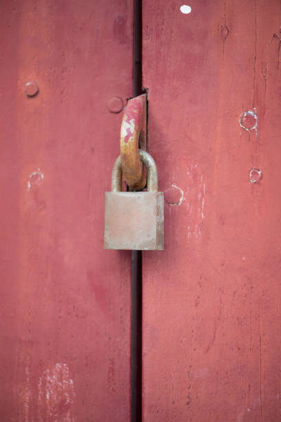 istock Lock on old wooden door 1144582811