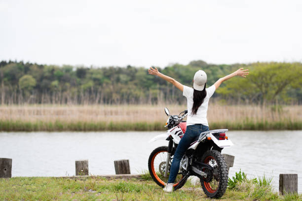 A motocross rider's adventure on a sunlit trail