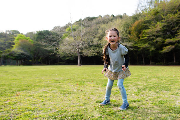 istock Girl playing with smile 1144585238