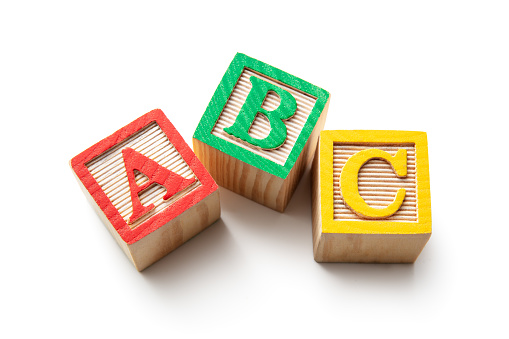 Juguetes: bloques alfabéticos-ABC aislado sobre fondo blanco photo