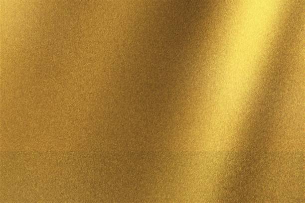 istock Abstract texture background, light shining on golden metal wall 1144589740