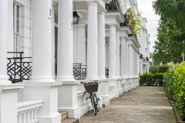 Classic entrances to residential buildings in a street of the Kensington district at London city, England, UK. Classic entrances to residential buildings in a street of the Kensington district at London city, England, UK. kensington and chelsea stock pictures, royalty-free photos & images