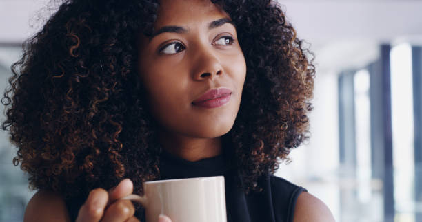 istock Contemplating the day with coffee 1144591979