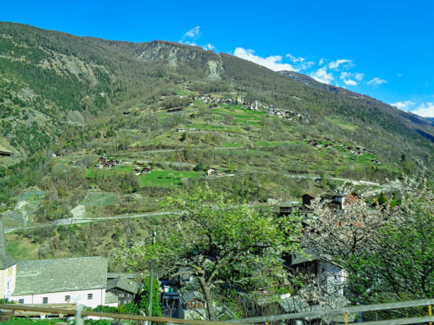 istock view to a small village on the alps in summer 1144594456