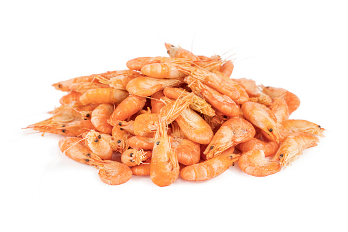 heap of small red shrimps isolated on white background