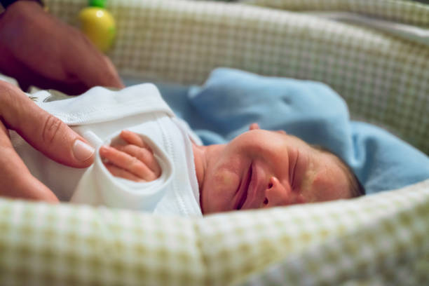 istock Newborn baby crying 1144598275
