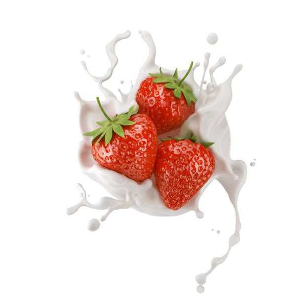 istock strawberries with milk splash or yogurt cream. 1144599354