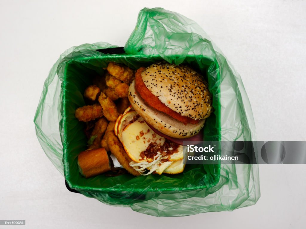 Garbage Processed Snacks Fast Food Waste In A Biodegradable Garbage Bag Stock Photo - Download ...