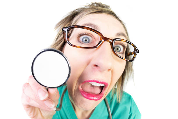 A funny fisheye video clip of a crazy looking nurse with a stethoscope.