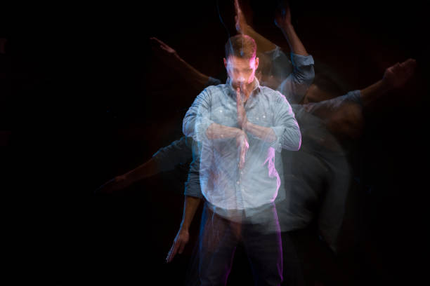istock Handsome man in a blue shirt dancing 1144602831