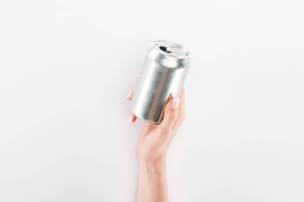 istock Partial view of woman holding empty can on grey background 1144603739
