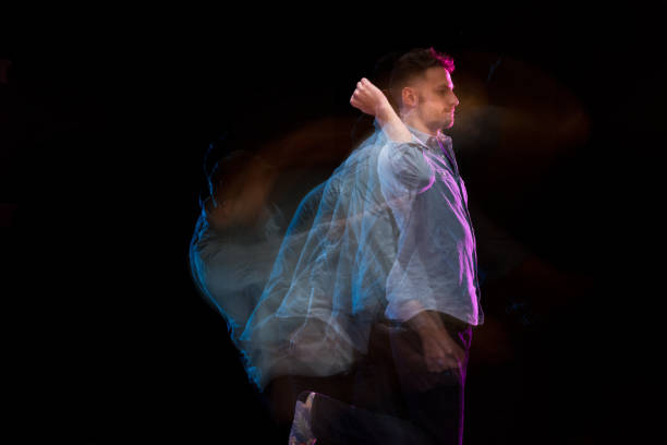 istock Handsome man in a blue shirt dancing 1144603819