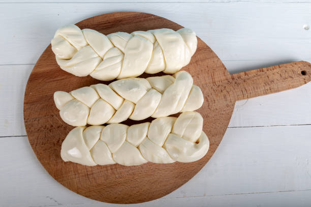 istock Turkish knitting cheese on wooden background 1144606284